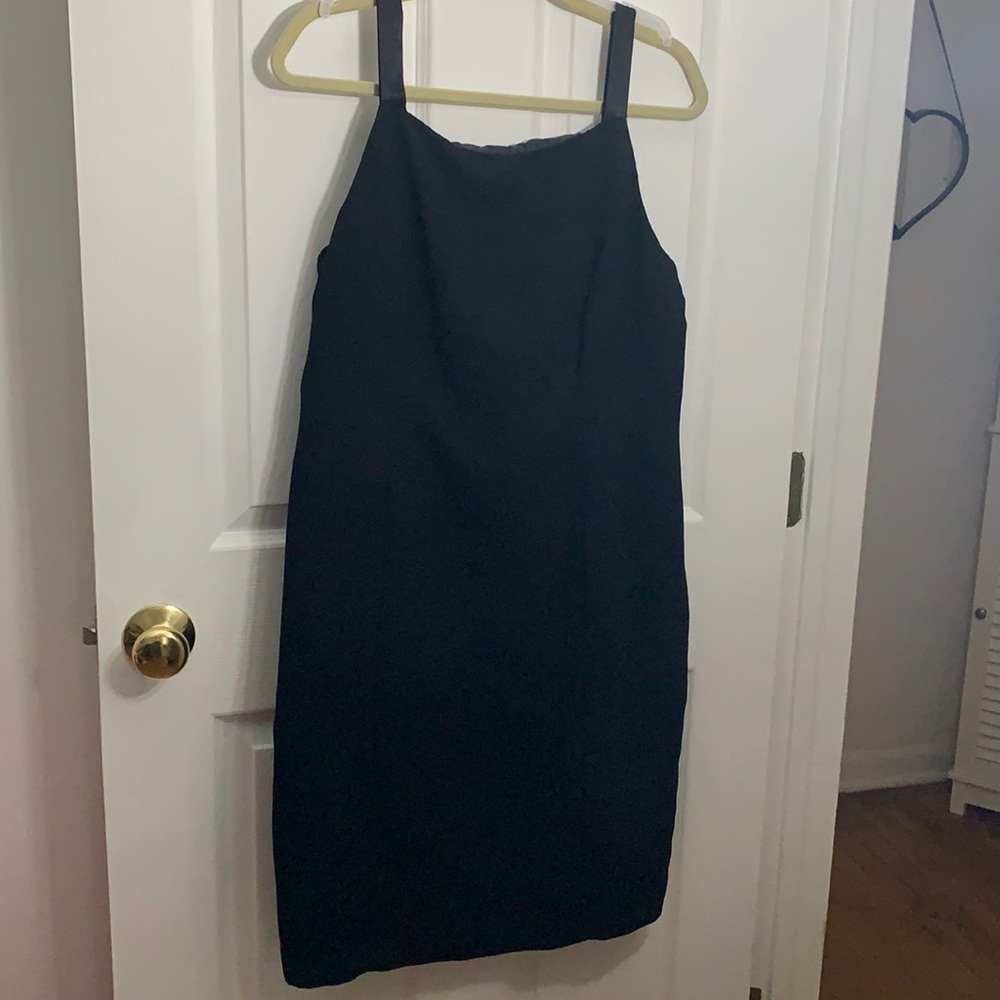 Little black mini dress with satin straps and satin black bow on the back
